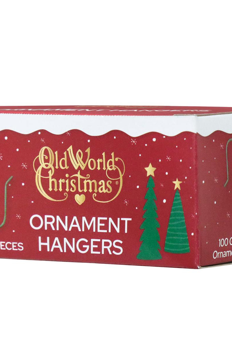 Box of 100 green wire Christmas ornament hangers in festive red packaging with holiday tree and snowflake graphics.