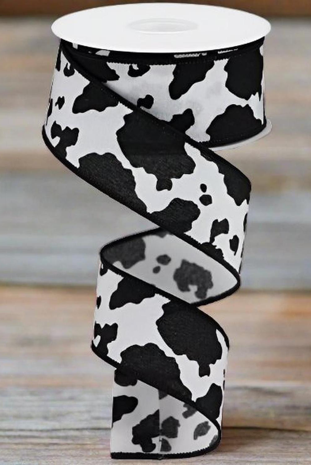Shop For 1.5" Fuzzy Cow Print Ribbon: Black & White (10 Yards) at Michelle's aDOORable Creations