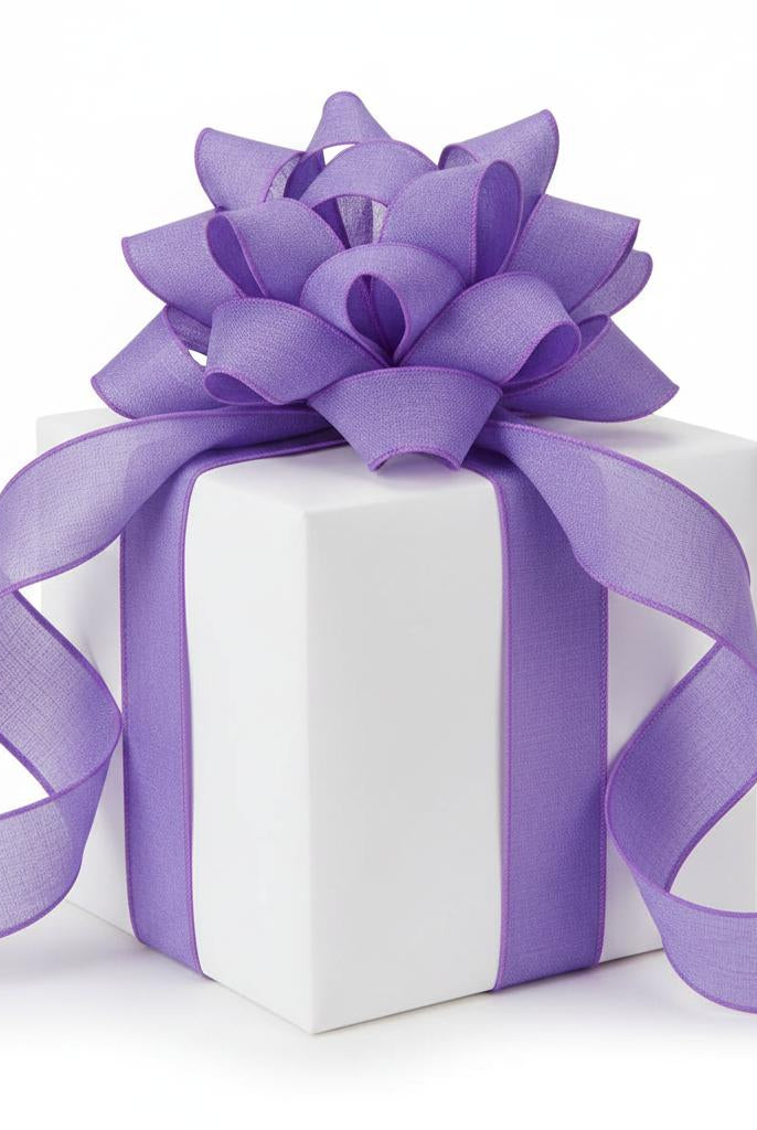 1.5-inch lavender royal canvas ribbon with a wired edge tied in a decorative bow on a white gift box.