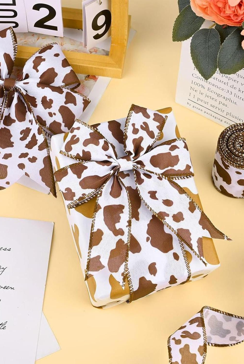 Shop For 2.5" Cowhide Fuzzy Ribbon: Brown & White (10 Yards) at Michelle's aDOORable Creations