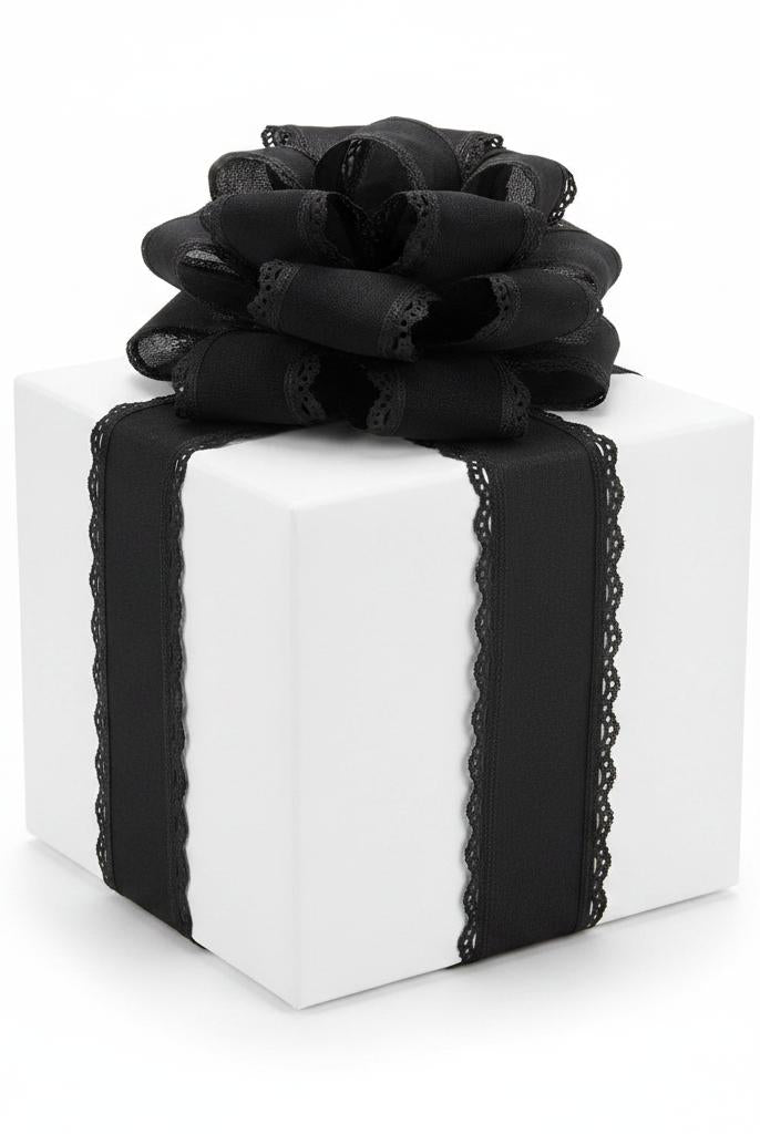 White gift box wrapped with 2.5-inch black wired ribbon featuring a delicate scalloped edge and a large decorative bow.