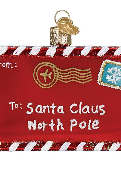 Red glass rectangular ornament shaped like a letter to Santa with white and red striped borders and a snowflake stamp.