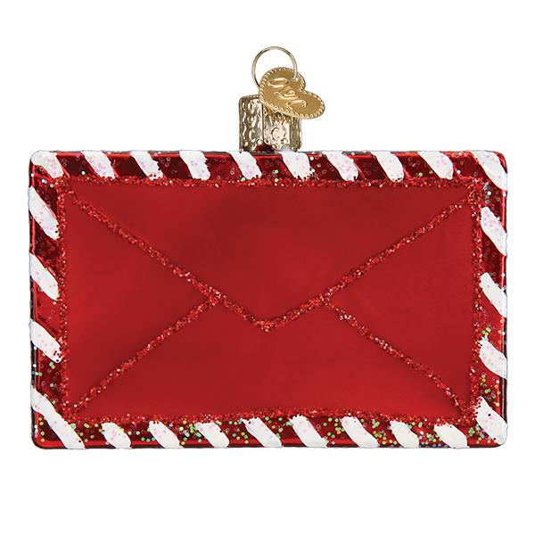 Red glass envelope ornament with glittery white and red candy cane striped borders and a gold heart charm topper.
