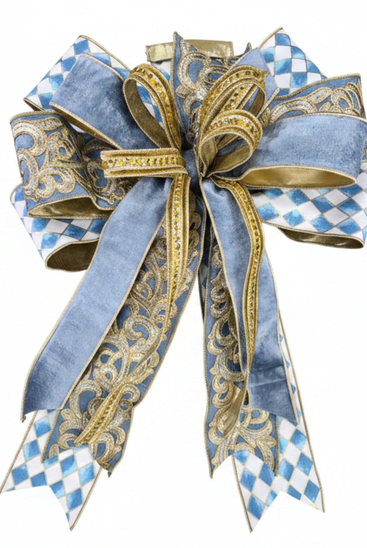 Large blue and gold harlequin patterned bow with velvet ribbon, intricate gold scrollwork, and jewel accents.