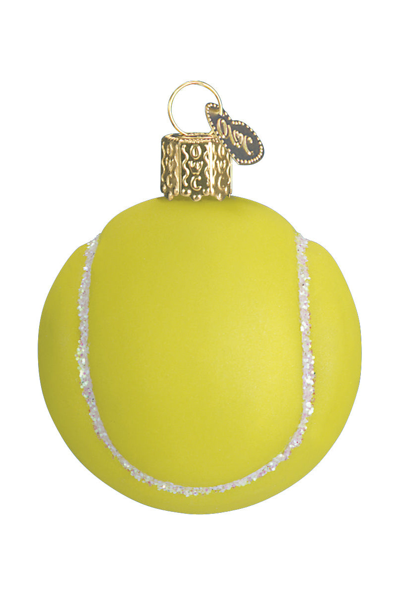 Mouth-blown glass tennis ball ornament in bright yellow with white glitter seams and a decorative gold hanging cap.