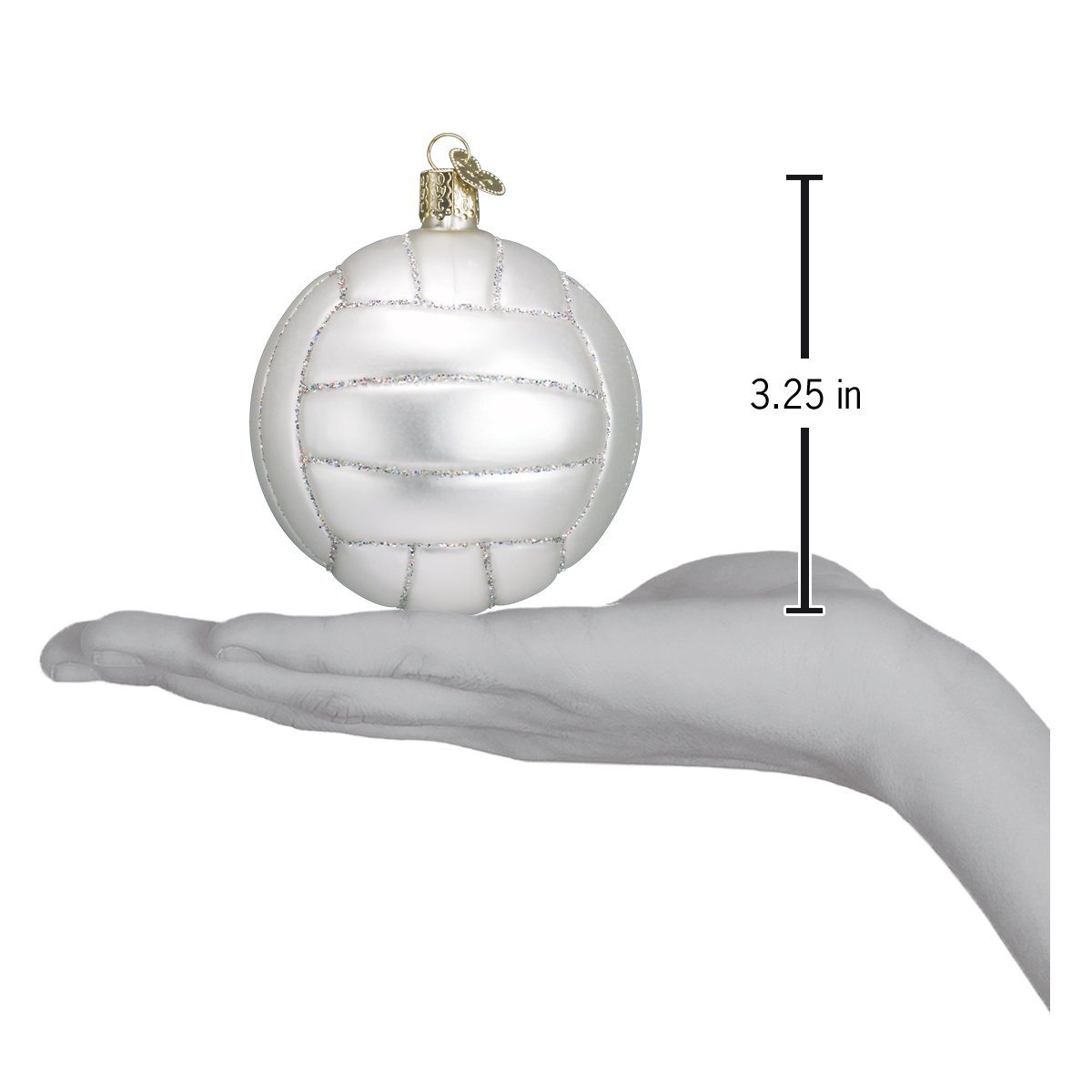 Mouth-blown white glass volleyball ornament with silver glitter accents, measuring 3.25 inches, held in a hand.