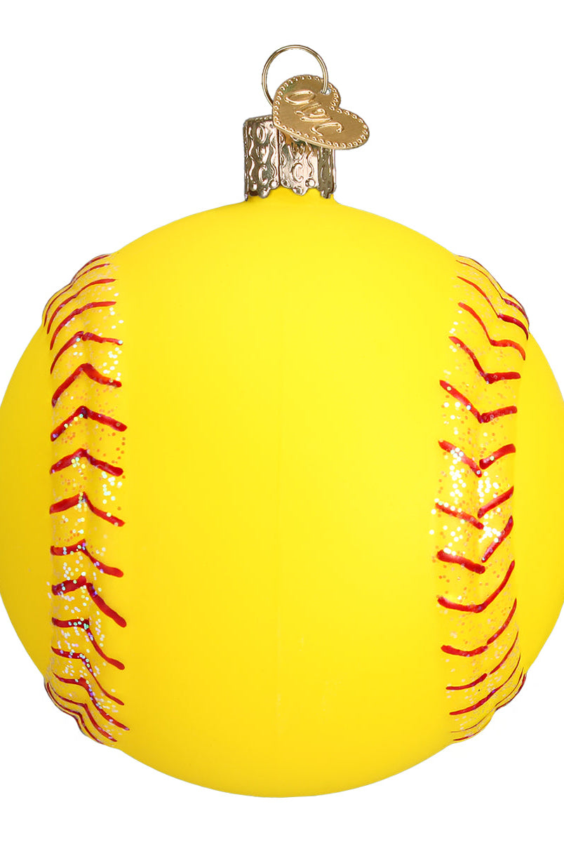 Bright yellow glass softball ornament with red glitter stitching and a gold heart-shaped charm topper.