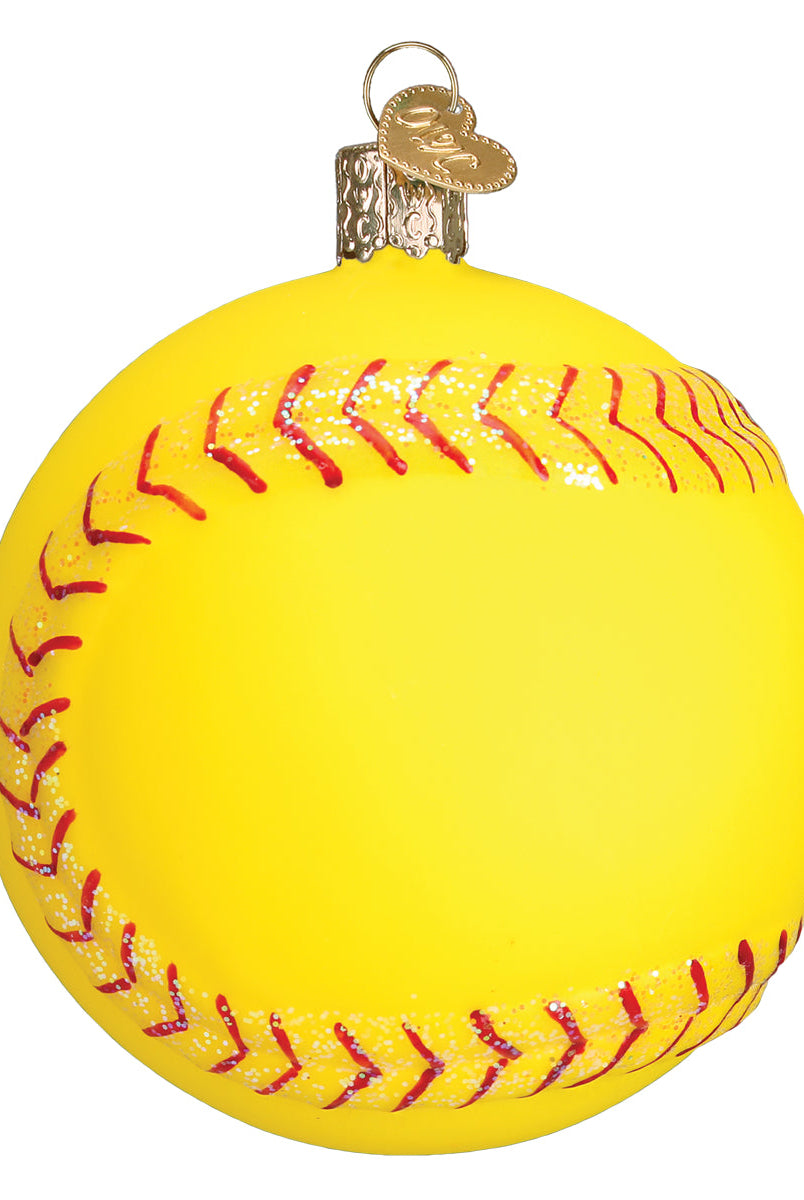Bright yellow glass softball ornament with red glitter stitching and a gold heart-shaped charm topper.