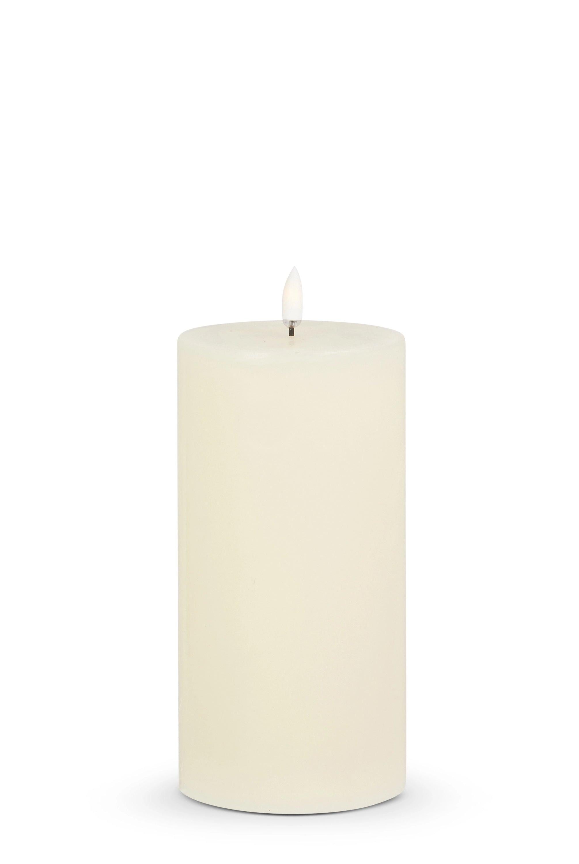 3.5-inch by 7-inch ivory wax LED pillar candle with a realistic flickering flame effect on a white background.