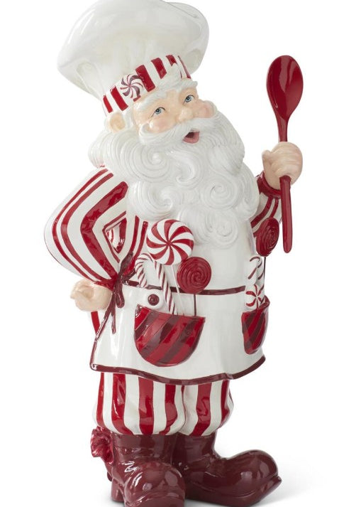 18-inch resin baker Santa figurine in red and white striped apron holding a spoon, decorated with candy accents.