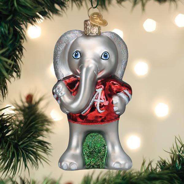 Glass Alabama Big Al elephant ornament wearing a shiny red jersey with a white script A logo on a Christmas tree.