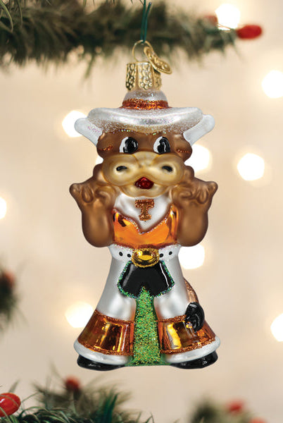 Old World Christmas glass Bevo Longhorn ornament wearing a white cowboy hat and orange and white Texas attire.