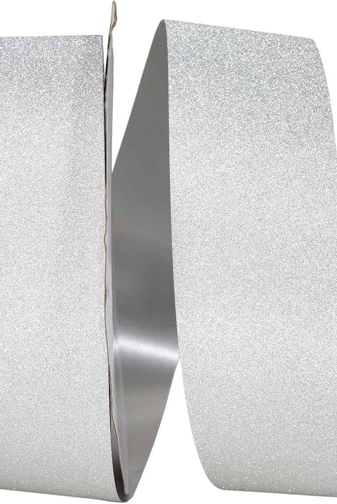 Spool of wide silver diamond dust glitter ribbon showing dense sparkle