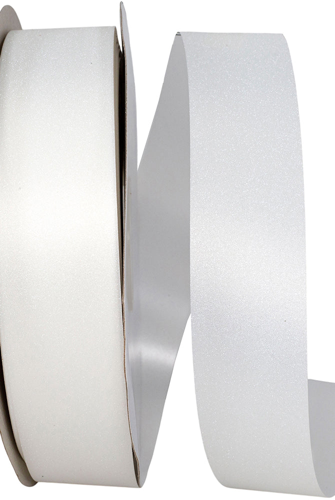 Spool of white shimmering non-wired ribbon with loose tail