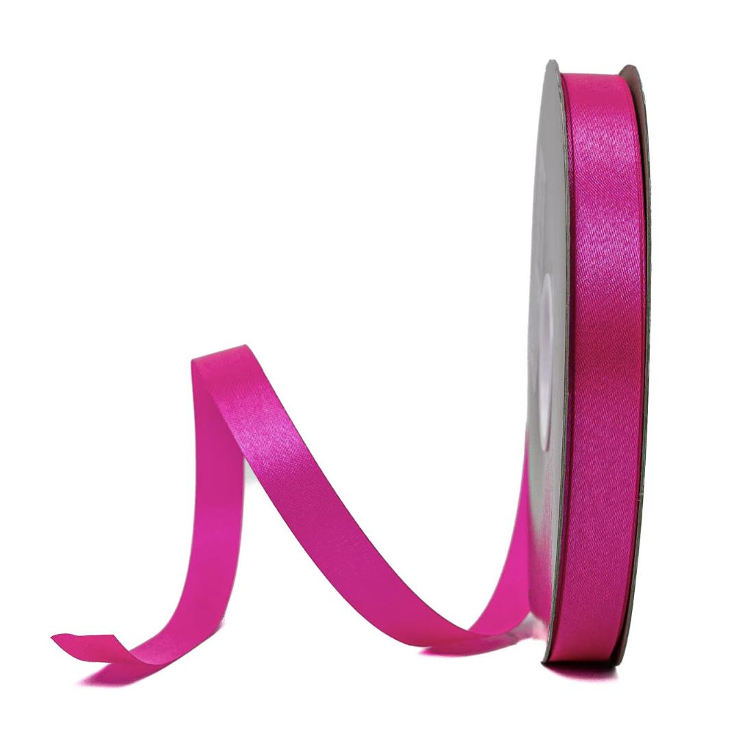 Hot Raspberry satin lustre ribbon spool with loose end curling left