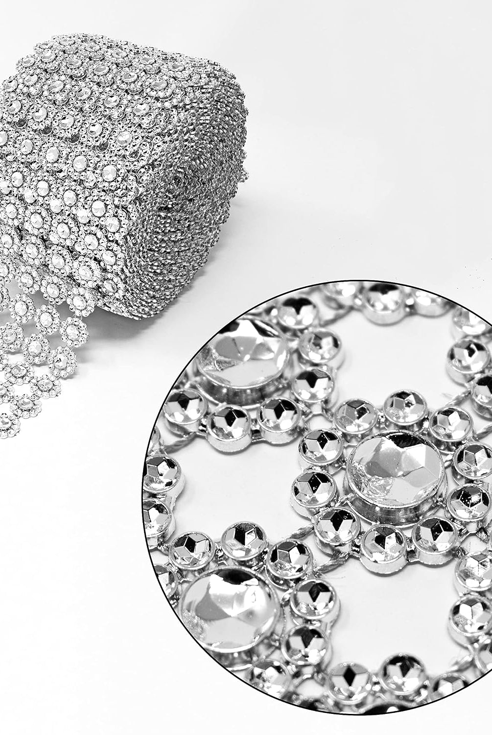 Roll of silver diamond bling wrap showing detailed flower pattern