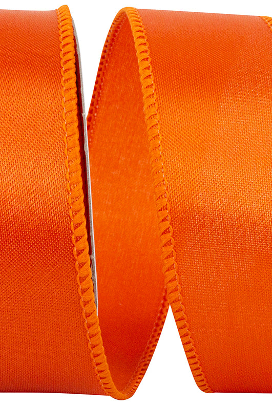 1.5-inch vibrant orange satin ribbon on a spool featuring durable stitched wired edges for easy shaping.