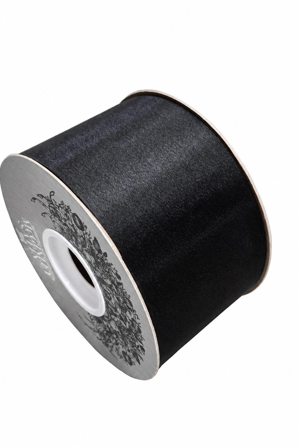 Close-up of black satin acetate ribbon texture on spool
