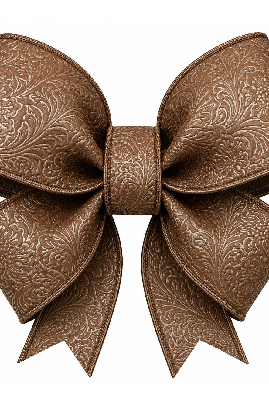 2.5-inch brown wired ribbon tied in a bow, featuring an intricate embossed floral pattern and textured finish.