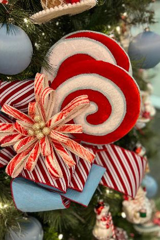 24-inch red and white spiral velvet peppermint lollipop stem in holiday arrangement