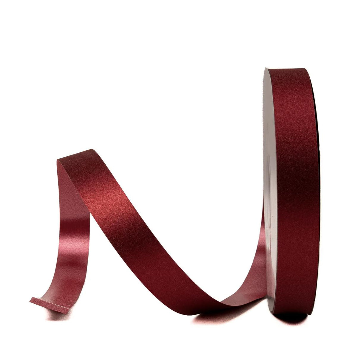 Red diamond dust glitter ribbon unspooling for homecoming mums