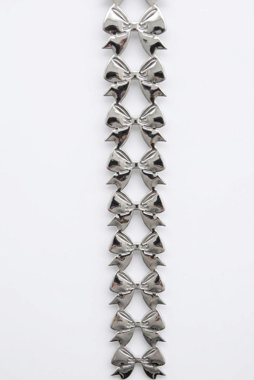 Silver metallic vinyl puffy bow garland streamer for homecoming