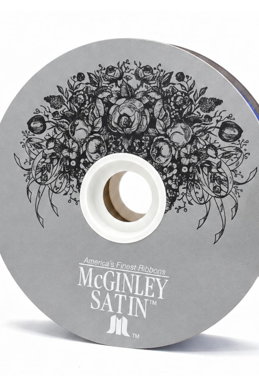 McGinley black satin acetate ribbon spool with floral label