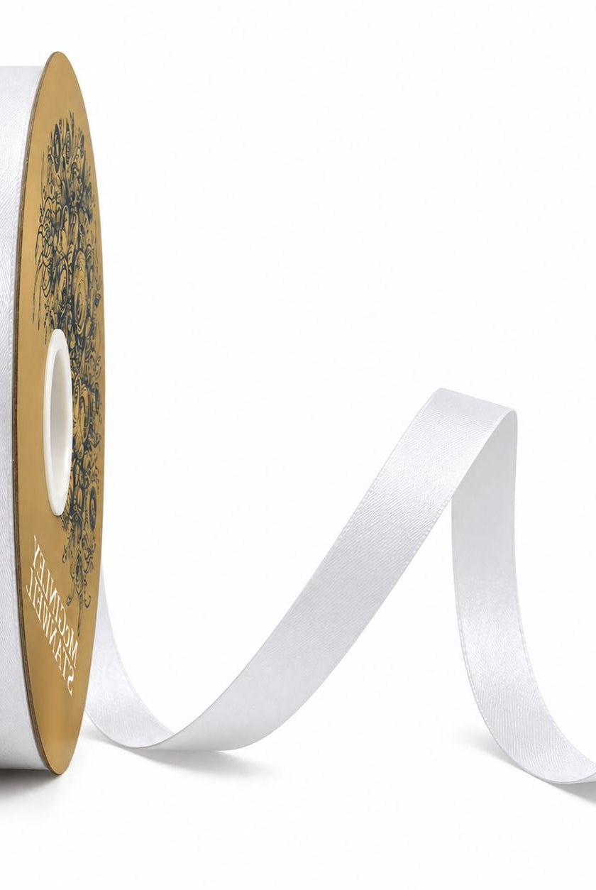 McGinley white satin ribbon spool with gold cardboard label