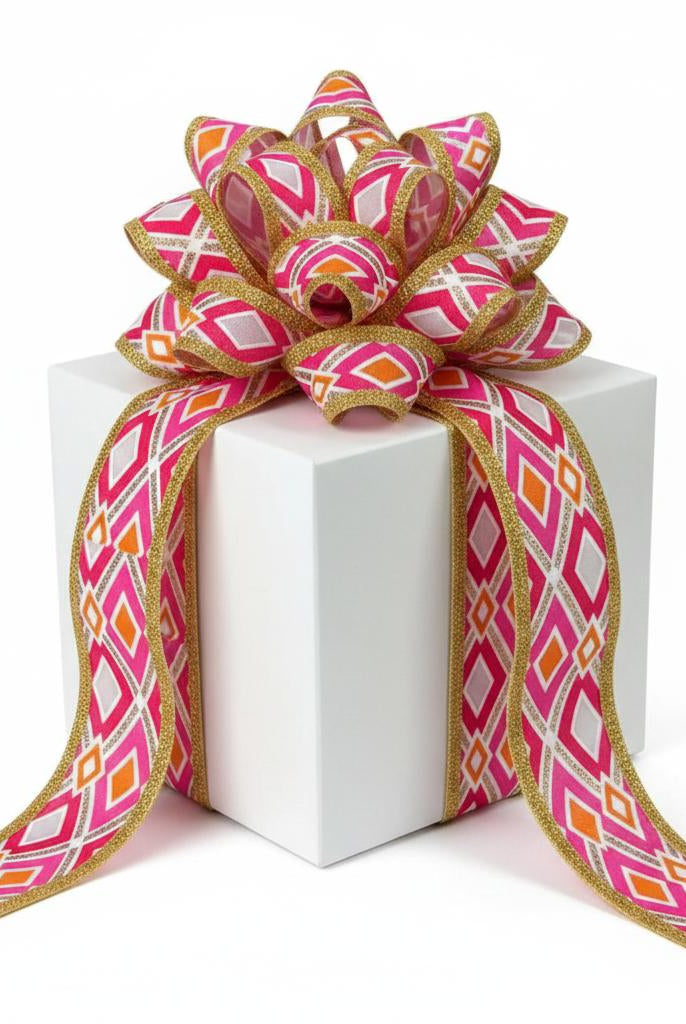 1.5-inch wired ribbon with orange, gold, and fuchsia abstract diamond pattern and metallic gold edges on a gift box.