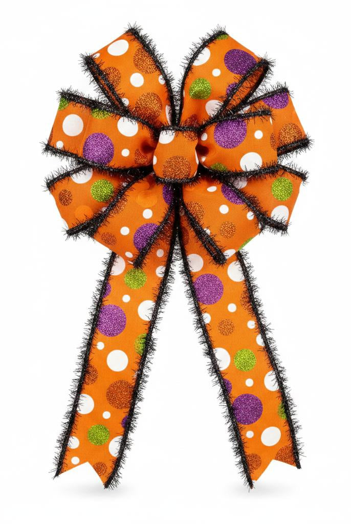 1.5-inch orange Halloween ribbon bow with glittery polka dots and black tinsel edges.