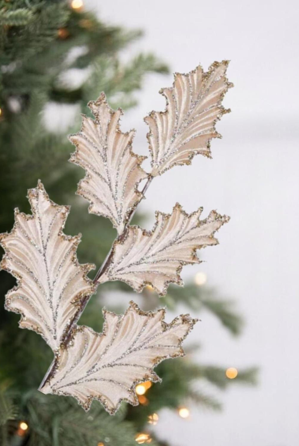 28" Tinsel Holly Leaf Spray: Champagne