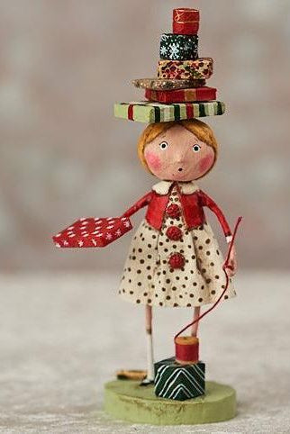 Shop For Wrappings and Ribbons Holiday Figurine by Lori Mitchell