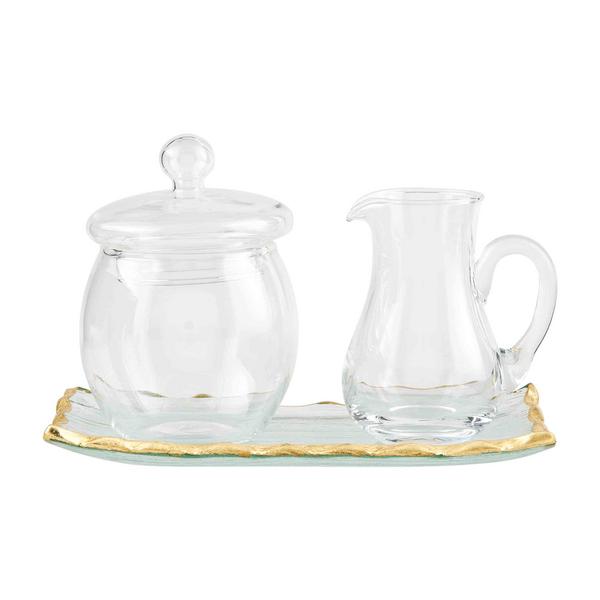 Clear glass cream and sugar set on a matching tray, featuring elegant hand-painted gold edges.
