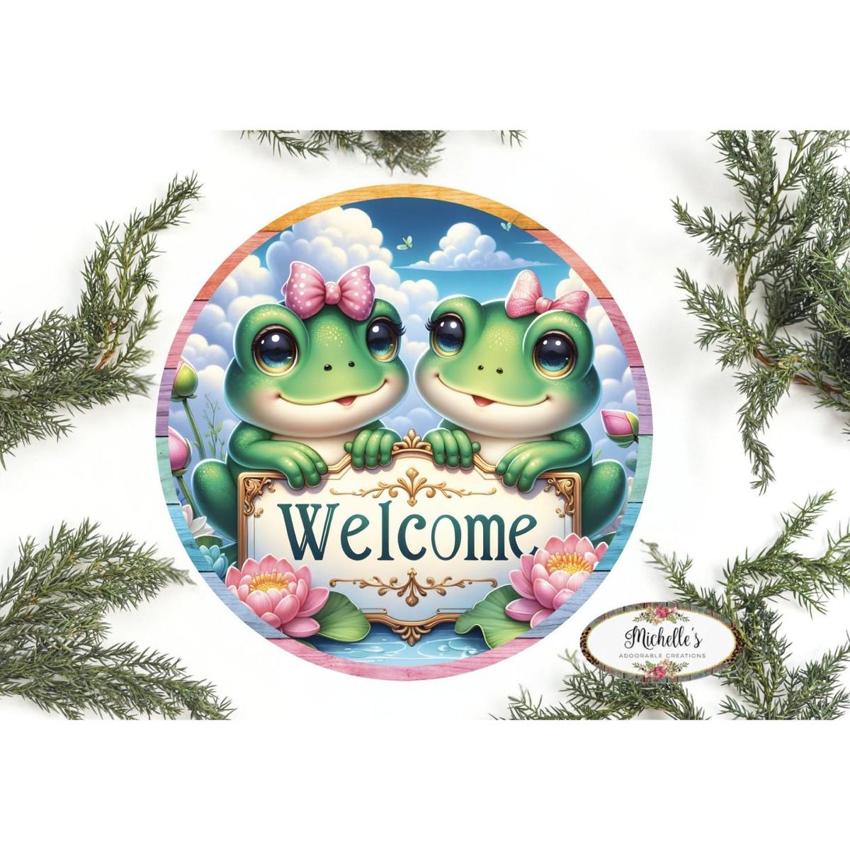 Shop For Welcome Double Frog Round Sign at Michelle's aDOORable Creations