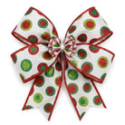 Decorative bow made from white ribbon with red and green glitter bullseyes