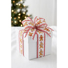 Gingerbread man wired ribbon bow on white gift box