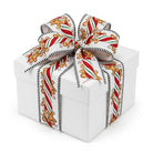 White wired ribbon with gingerbread men and peppermint sticks tied in a gift bow