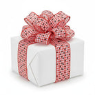 2.5-inch red and white gingham ribbon with black polka dots tied in a bow on a white gift box.