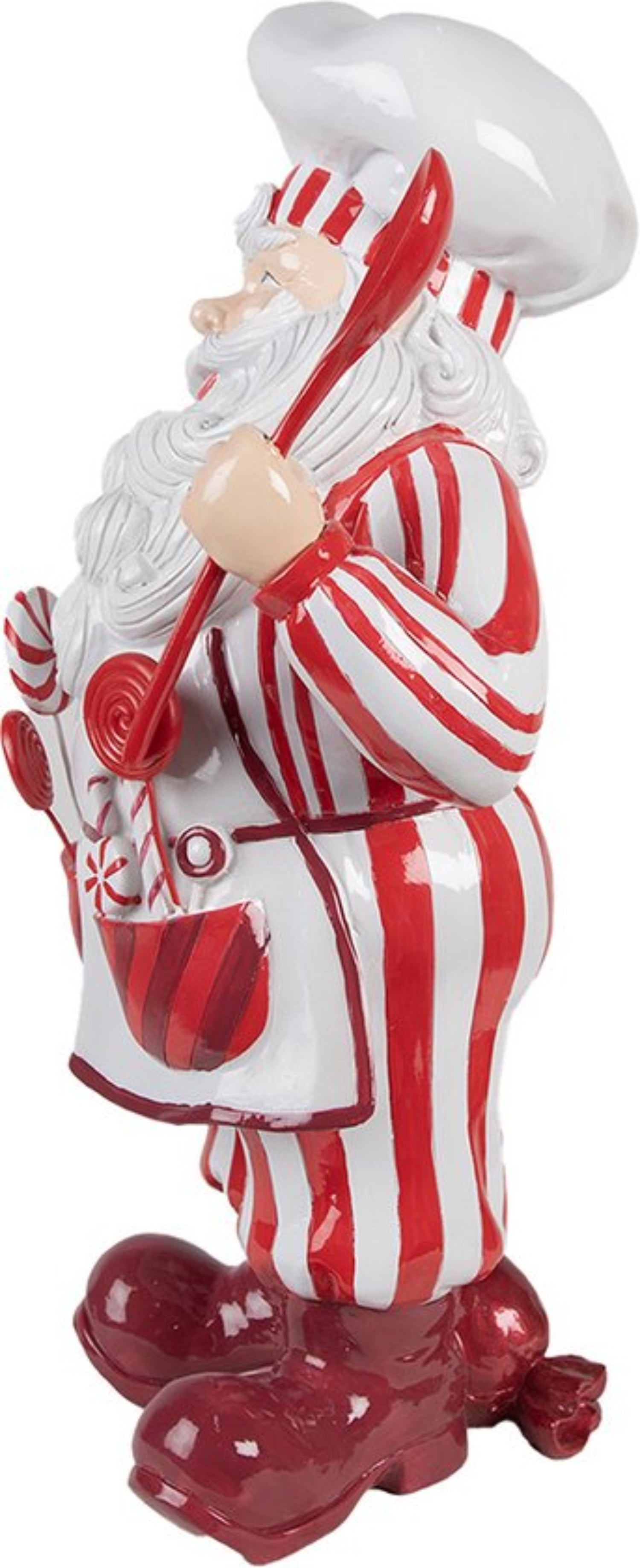 Side view of 19 inch resin Peppermint Chef Santa figurine with red spoon and candy apron
