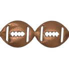 Close-up of copper metallic vinyl football streamer texture