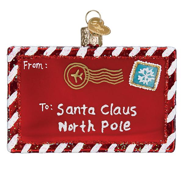 Red glass rectangular ornament shaped like a letter to Santa with white and red striped borders and a snowflake stamp.