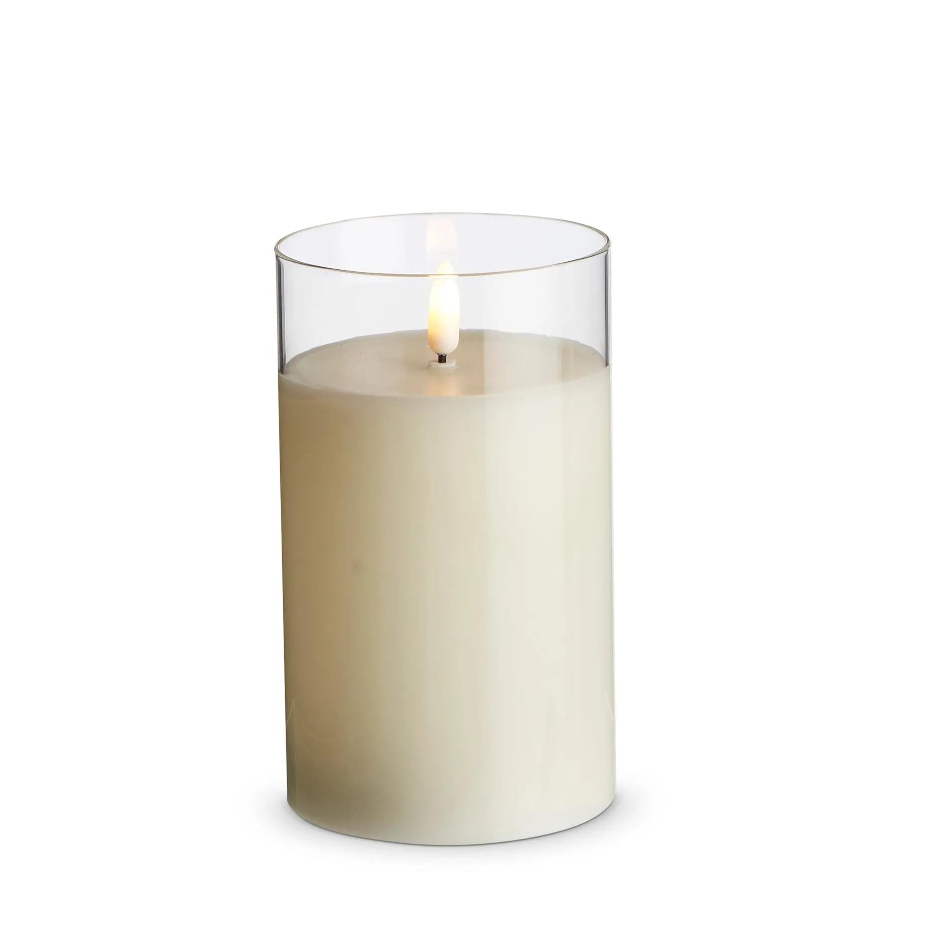 Ivory LED pillar candle in a 6-inch clear glass holder with a realistic flickering flame effect.