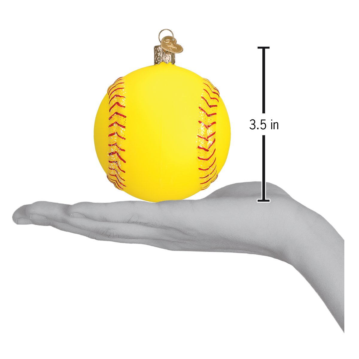 Yellow 3.5-inch softball Christmas ornament with red glitter stitching held in a hand.