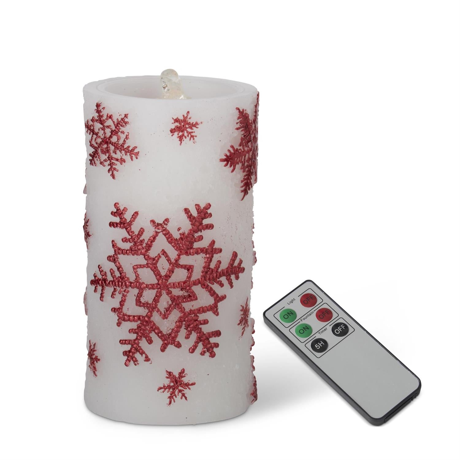 7.75-inch white wax LED pillar candle with red shimmering snowflakes and a water fountain feature, including a remote.