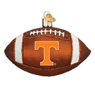 Brown glass football ornament featuring the orange Tennessee Volunteers T logo with white glitter accents.