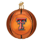 Glittery orange glass basketball ornament featuring the Texas Tech Red Raiders logo on a smooth center panel.
