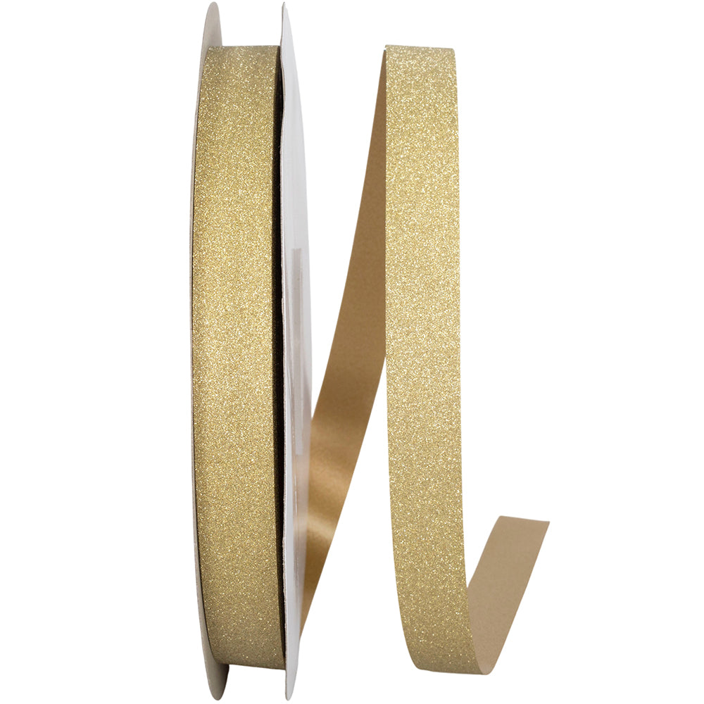 Spool of gold glitter ribbon showing matte tan backing and sparkle