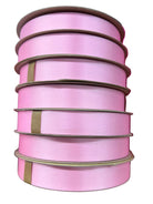 Stack of #5 pink lustre satin ribbon rolls, 7/8 inch wide, non-wired for homecoming mums and floral arrangements.