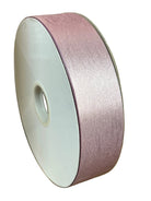 Spool of #9 pink diamond dust non-wired ribbon with a shimmering metallic texture for homecoming mums.