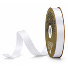 McGinley white satin ribbon spool with gold label